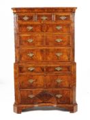 A George II figured walnut chest on chest