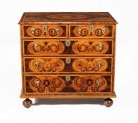 A William & Mary olivewood oyster veneered and specimen marquetry chest of drawers