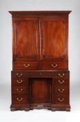 A George III mahogany press cupboard