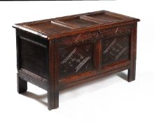 A Charles II panelled oak coffer