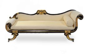 A Regency ebonised and parcel gilt day bed