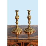 A pair of substantial gilt bronze candlesticks in Louis XV style
