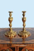 A pair of substantial gilt bronze candlesticks in Louis XV style