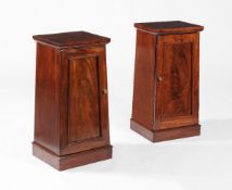 A pair of Victorian mahogany bedside cupboards