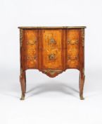 ϒ A rosewood, bois satine and specimen marquetry commode, in Louis XVI style