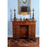 ϒ A William & Mary kingwood and oyster veneered kneehole desk