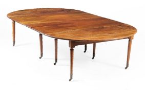 A French solid walnut extending dining table