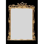 A George III carved giltwood and gesso wall mirror