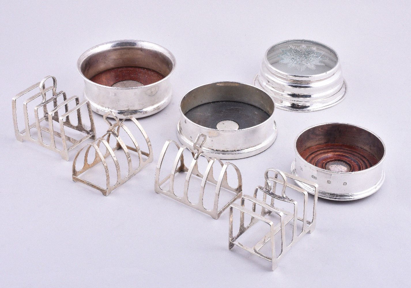 Two pairs of silver toast racks