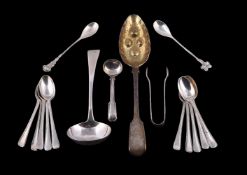 A small collection of silver flatware