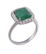 An emerald and diamond ring