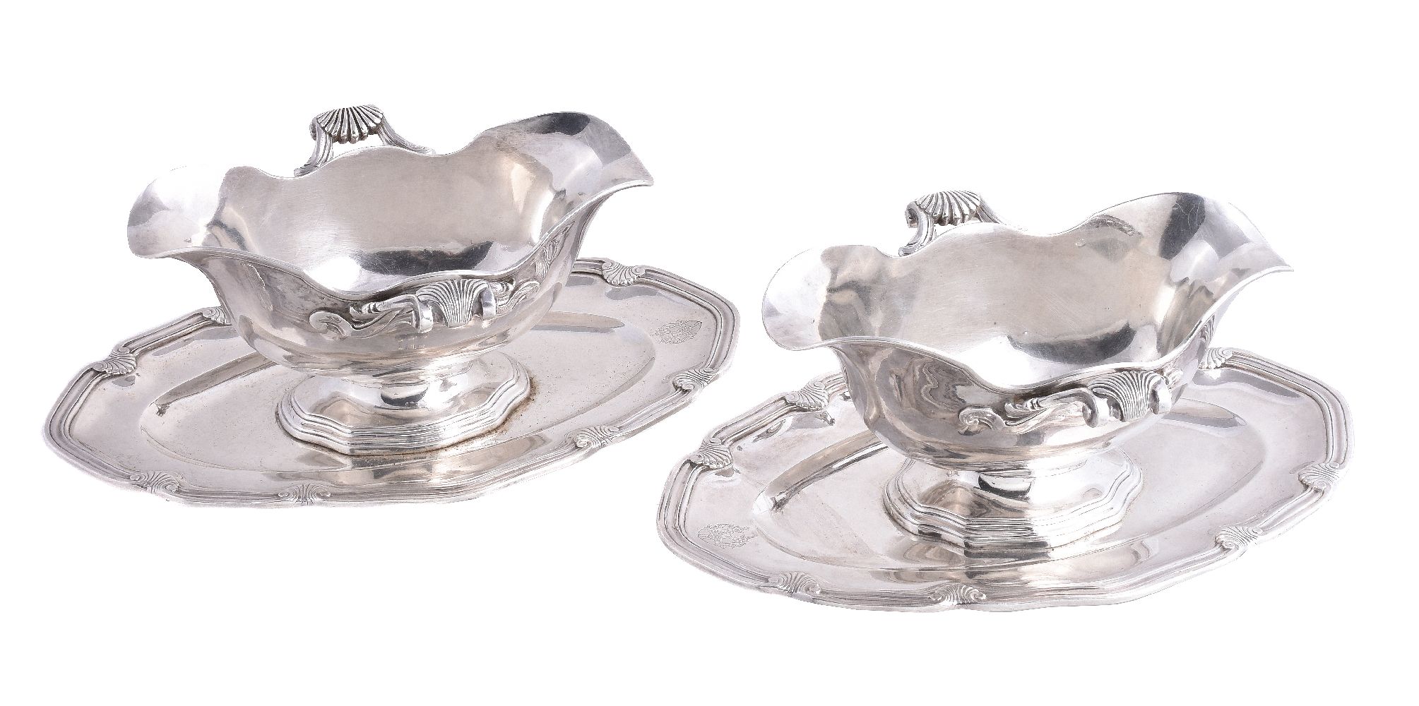 A pair of 19th century silver shaped oval sauce boats on stands