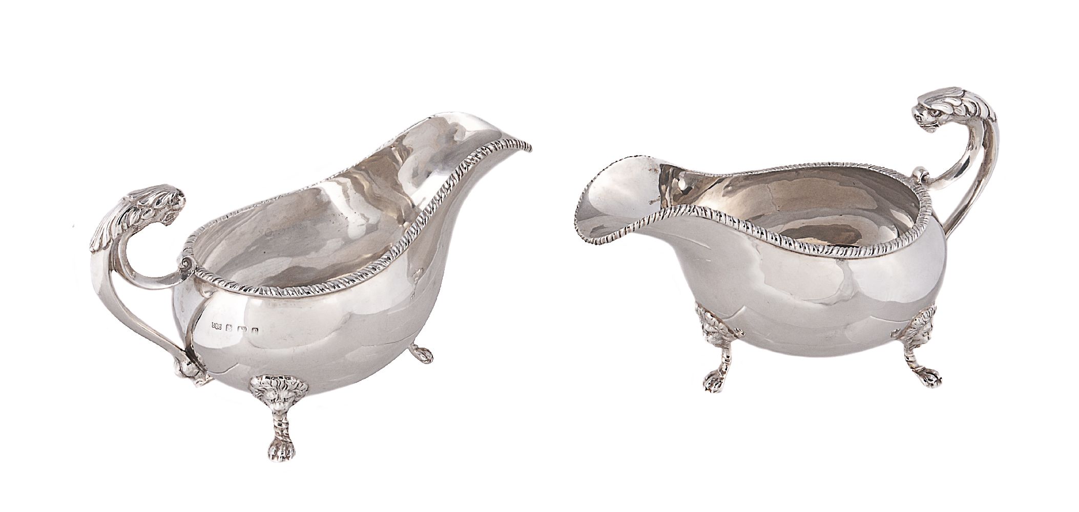 A pair of Edwardian silver oval sauce boats by Daniel George Collins