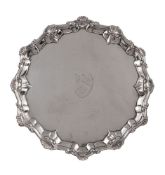 A George II silver shaped circular waiter by Ebenezer Coker