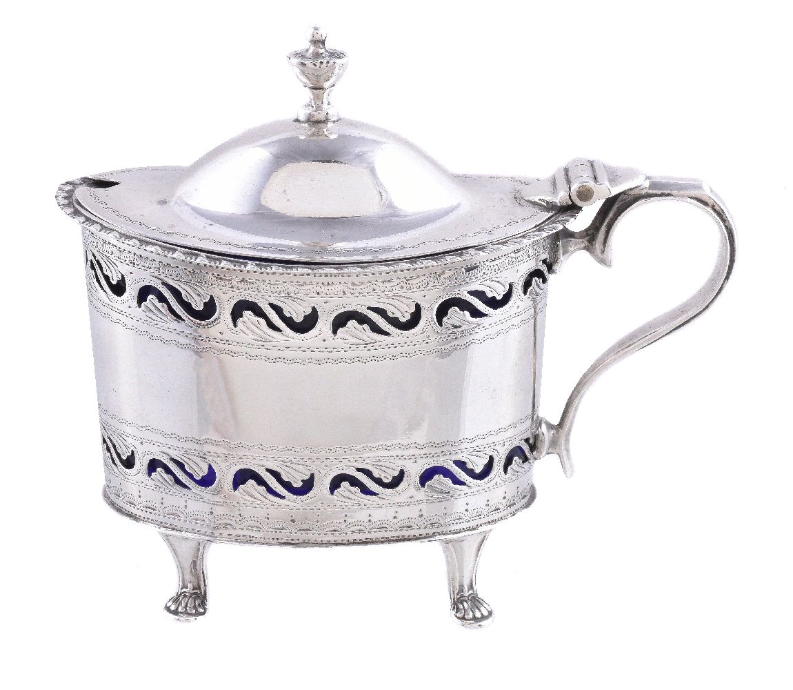 An Edwardian silver straight-sided oval mustard pot by George Nathan & Ridley Hayes