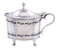 An Edwardian silver straight-sided oval mustard pot by George Nathan & Ridley Hayes