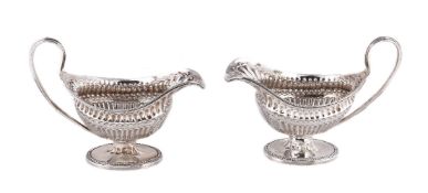 A pair of George III silver oval sauceboats