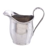 A silver oval cream jug by S. Blanckensee & Son Ltd