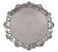 A late George II silver shaped circular waiter by Ebenezer Coker & Thomas Hannam