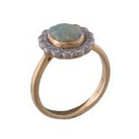An 18 carat gold opal and diamond cluster ring