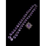 A mid 20th century amethyst riviere necklace