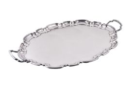 An electro-plated shaped oval twin handled tray by Mappin & Webb