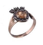 A topaz and diamond antique ring