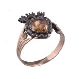 A topaz and diamond antique ring