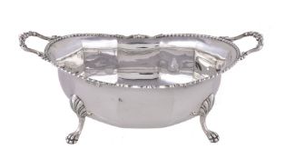 A silver panelled oval bowl by Josiah Williams & Co. (David Landsborough Fullerton)