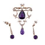 An amethyst and diamond brooch/pendant