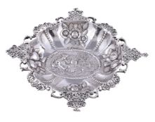 A silver shaped circular dish