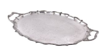 An electro-plated shaped oval twin handled tray by Mappin & Webb