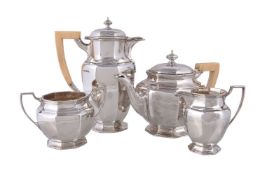 ϒ A silver octagonal baluster four piece tea service by Mappin & Webb