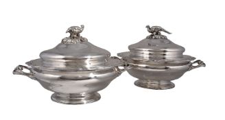 A pair of electro-plated shaped circular tureens and covers