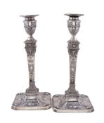 A pair of late Victorian silver candlesticks by Martin, Hall & Co