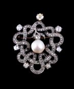 A diamond, coloured diamond and mabé pearl brooch