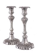 A pair of electro-plated shaped circular candlesticks by Mappin & Webb