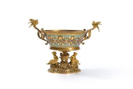 ‡ A gilt bronze and champlevé enamel twin-handle centrepiece in the Renaissance Revival taste