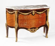 ‡ ϒ A French palisander, tulipwood and stained sycamore serpentine commode