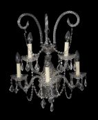 A set of eight moulded glass five light wall appliques in George III taste