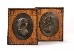 A pair of French bronze relief portrait plaques of King Mitaros of Egypt and Queen Nitocris of Babyl