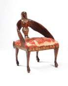 ‡ ϒ A carved hardwood and mother-of-pearl, bone and ivory inlaid ‘Egyptomania’ armchair