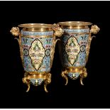 ‡ A pair of gilt metal and champlevé enamel twin-handle vases in the Orientalist taste