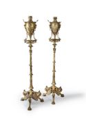 A pair of French gilt bronze standard oil lamps in the Pompeiian Revival taste
