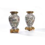 ‡ A pair of French cloisonné enamel vases in gilt bronze mounts in the Japonisme taste