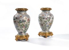 ‡ A pair of French cloisonné enamel vases in gilt bronze mounts in the Japonisme taste