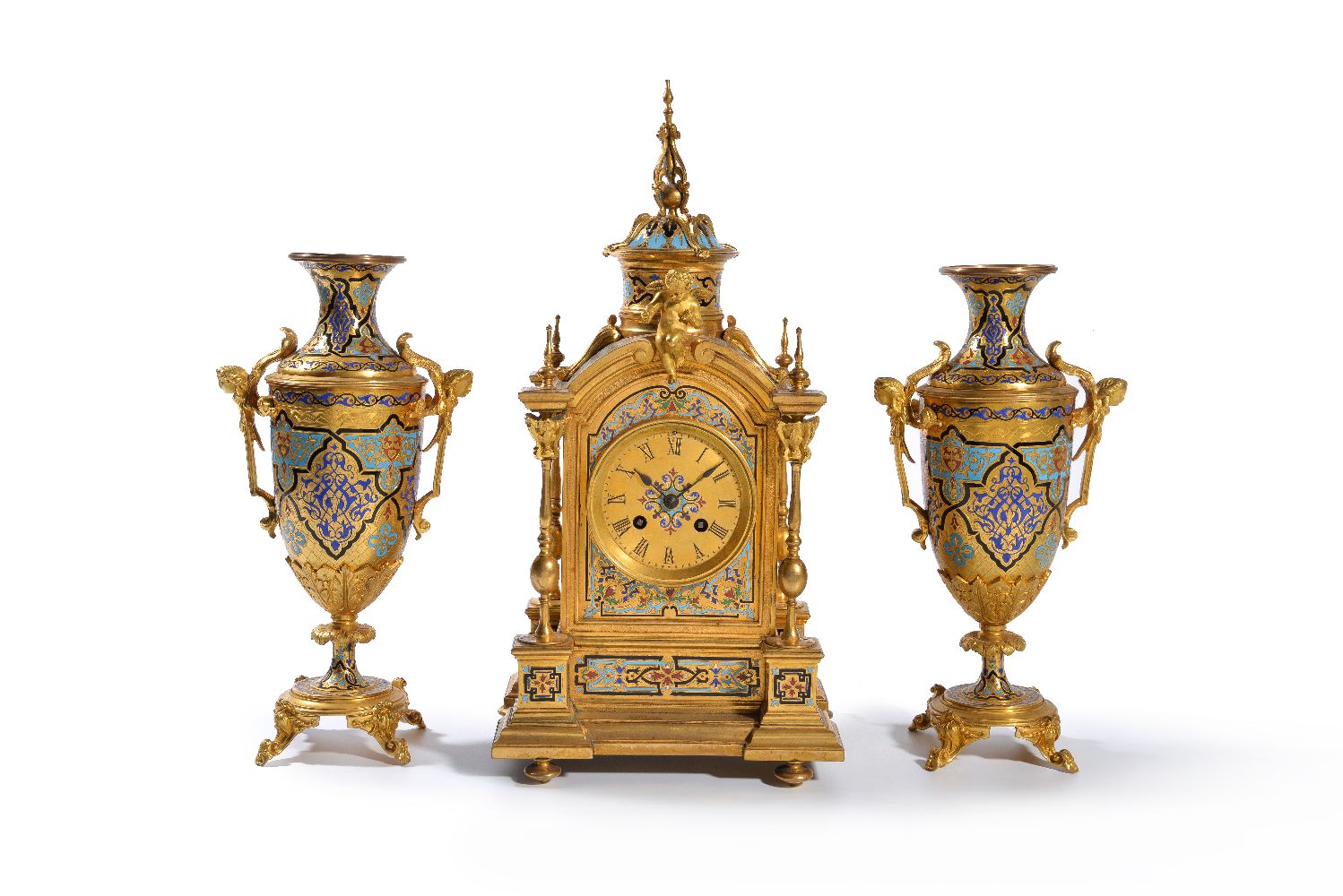 ‡ A French gilt bronze and champlevé enamel clock garniture in Renaissance Revival taste