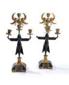 ‡ A pair of French parcel gilt bronze five light figural candelabra in Egyptian Revival taste