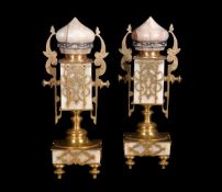 ‡ A pair of onyx, champleve enamel and gilt metal gerniture ornaments in the Islamic taste