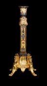 ‡ A Napoleon III champlevé enamel and gilt bronze candlestick in the Neo-Grec taste